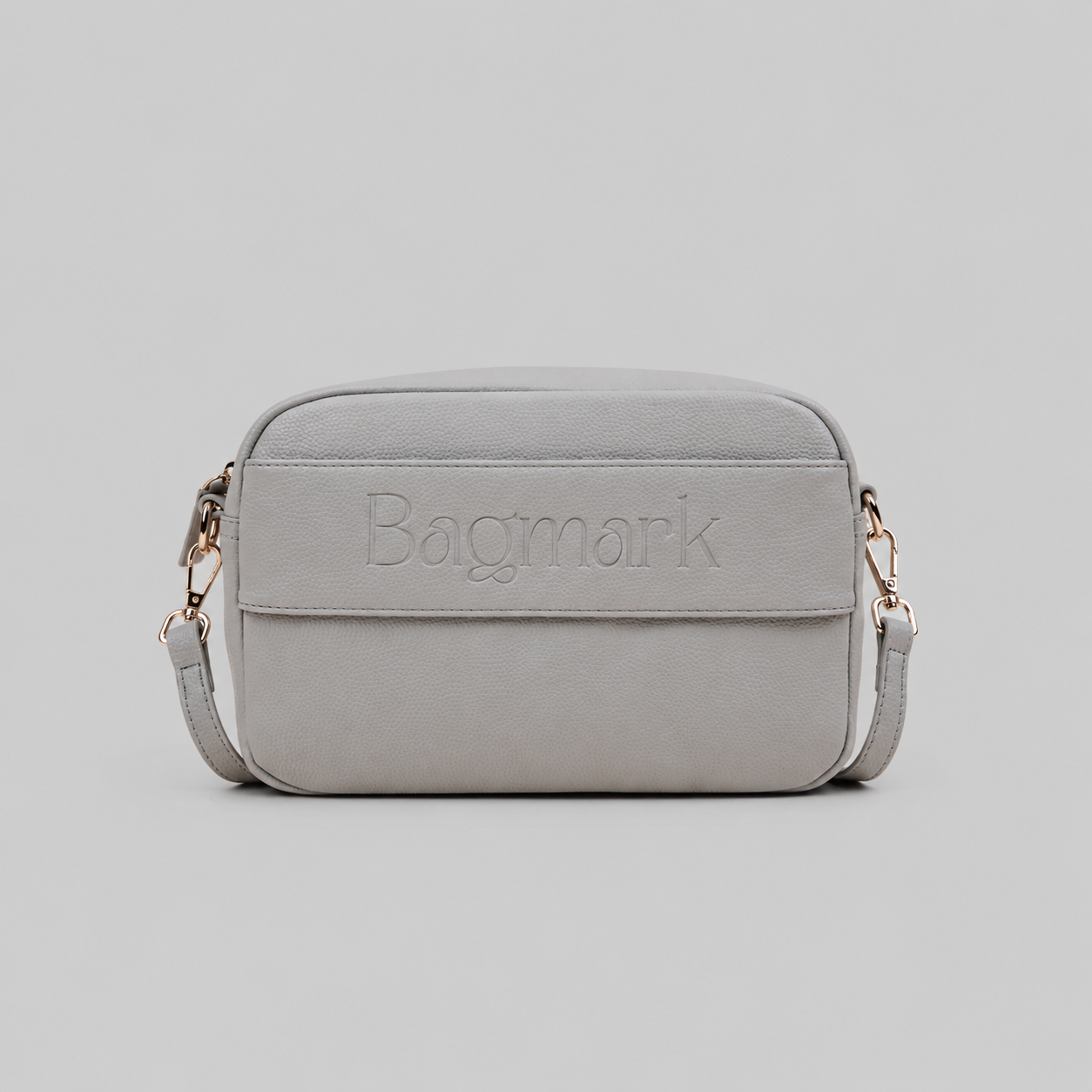 The Daily bag in Stone bookmark-inspired crossbody bag