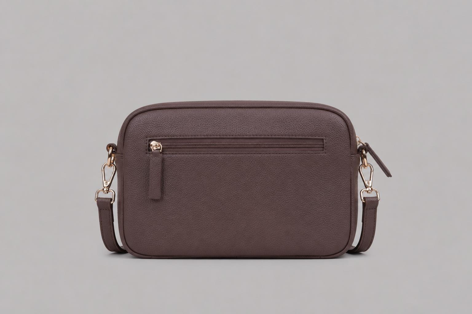 The Daily bag in Taupe brown literary bag displaying back zip pocket